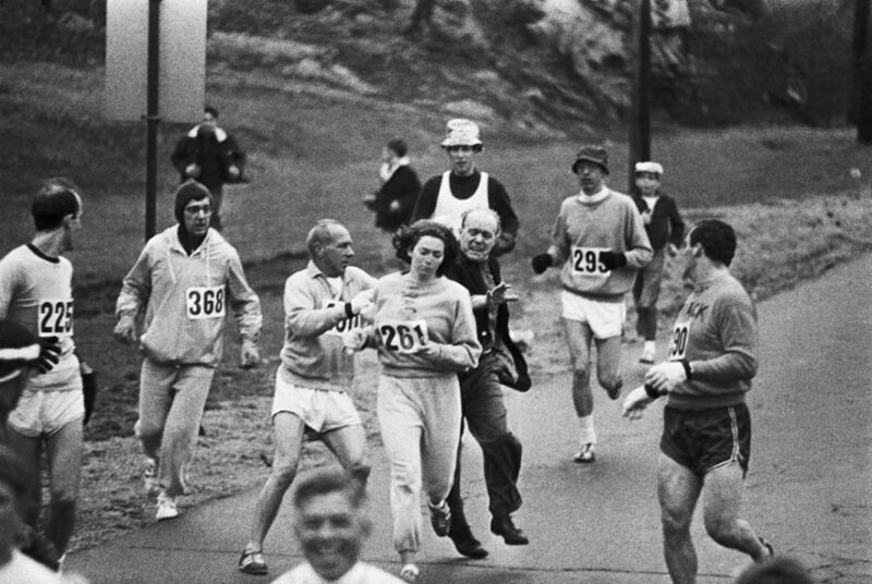 1967, Kathrine Switzer tries to complete the Boston Marathon as event organizers try to stop her