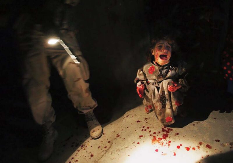 2005-Iraqi-Girl-At-Checkpoint